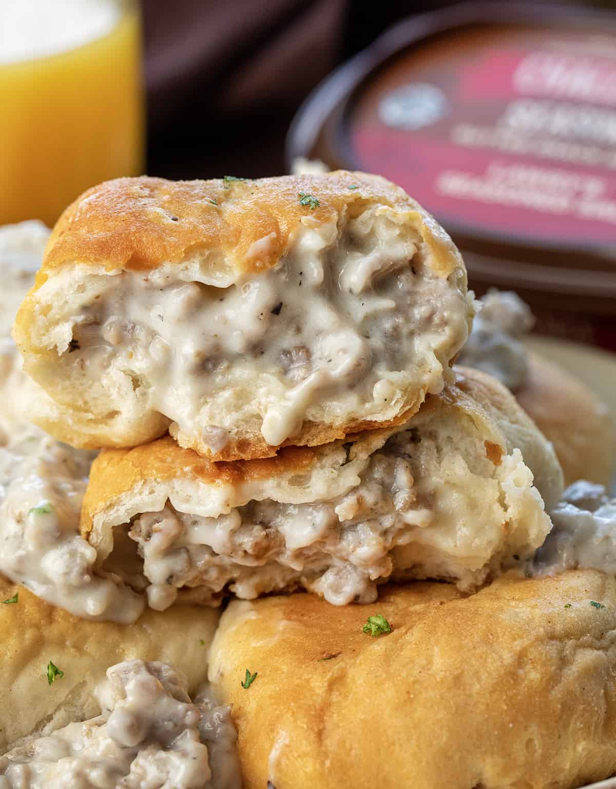 Halved Seasoned Biscuits and Gravy Bombs Showing Gravy Inside.