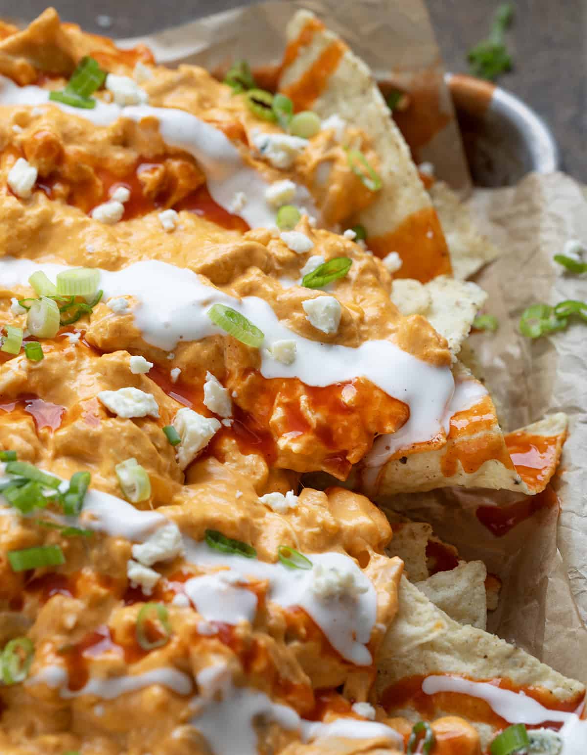 Close up of Buffalo Chicken Nachos in Sheet Pan.