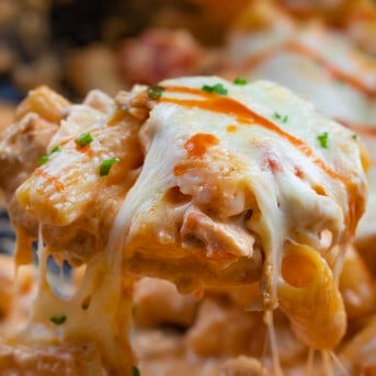 Very Close up of a Spoonful of Buffalo Chicken Pasta.
