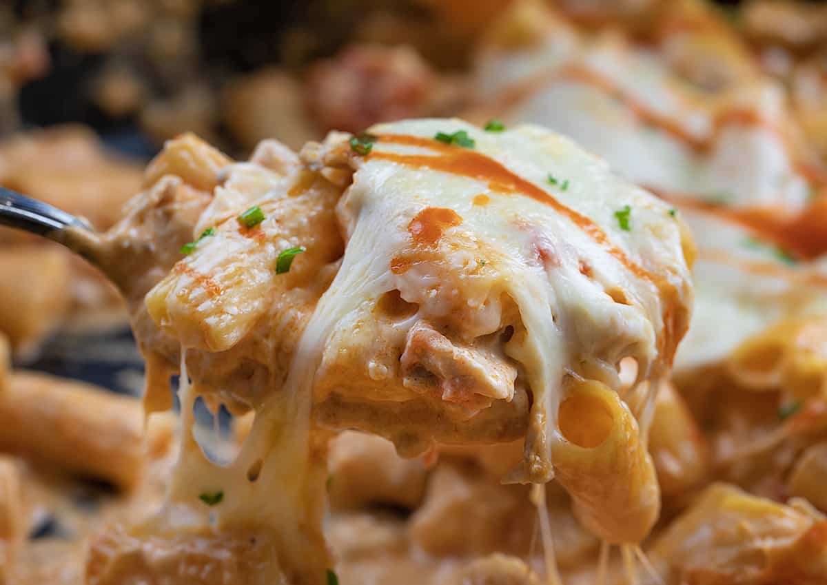 Very Close up of a Spoonful of Buffalo Chicken Pasta.