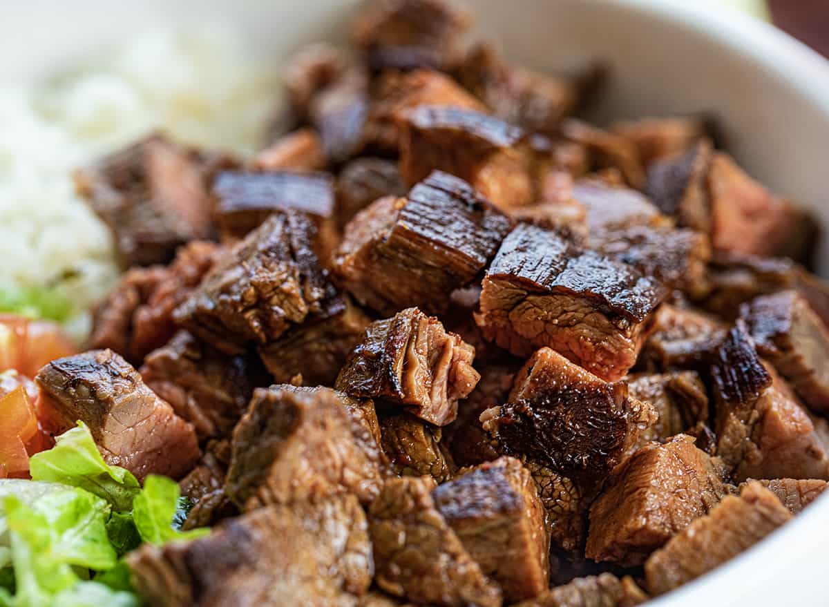 Chopped up Cubes of Chipotle Steak in a Bowl Very Close Up.