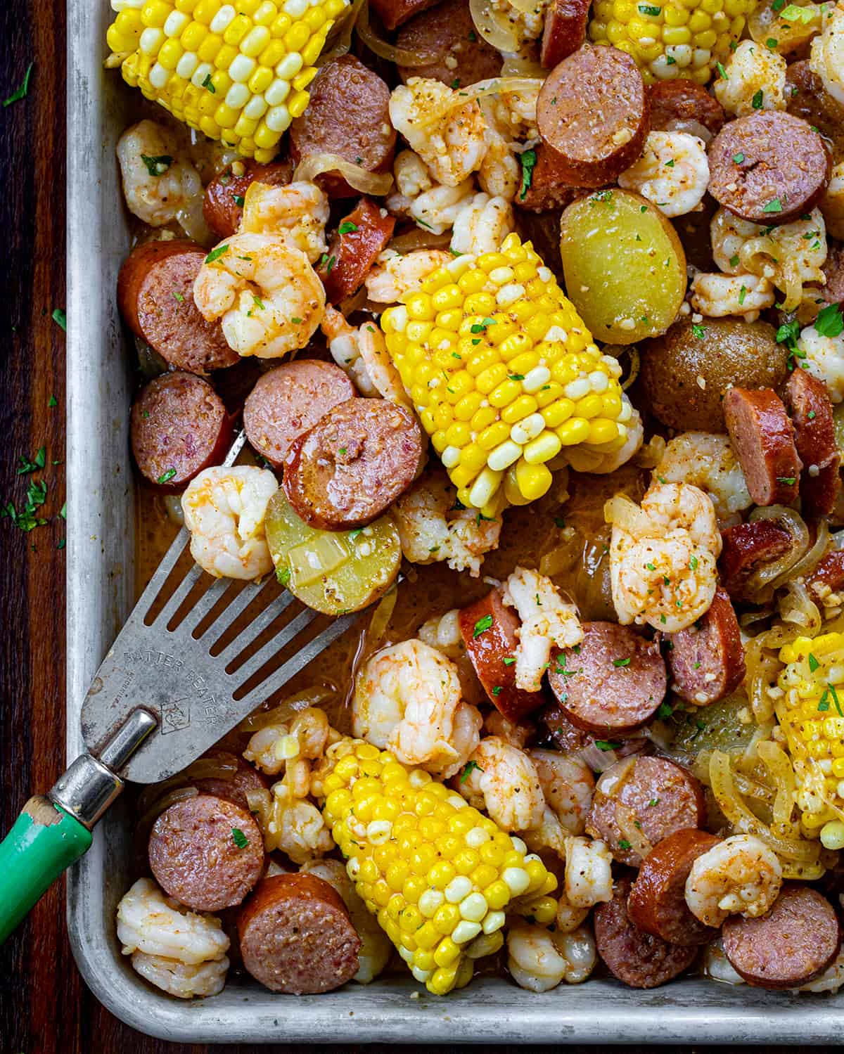 Easy Shrimp Boil on a Pan with a Spatula.