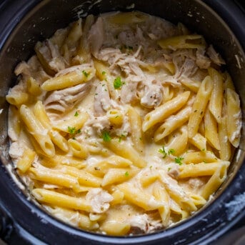 Olive Garden Chicken Pasta in a Black Crock Pot.