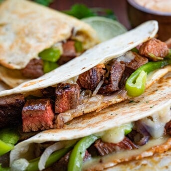 Close up of Chipotle Steak Quesadilla Resting on Their Side Showing Insdie.