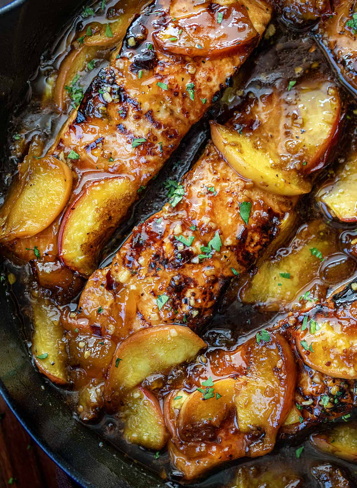 CLose up of Bourbon Peach Roasted Salmon in a Pan.
