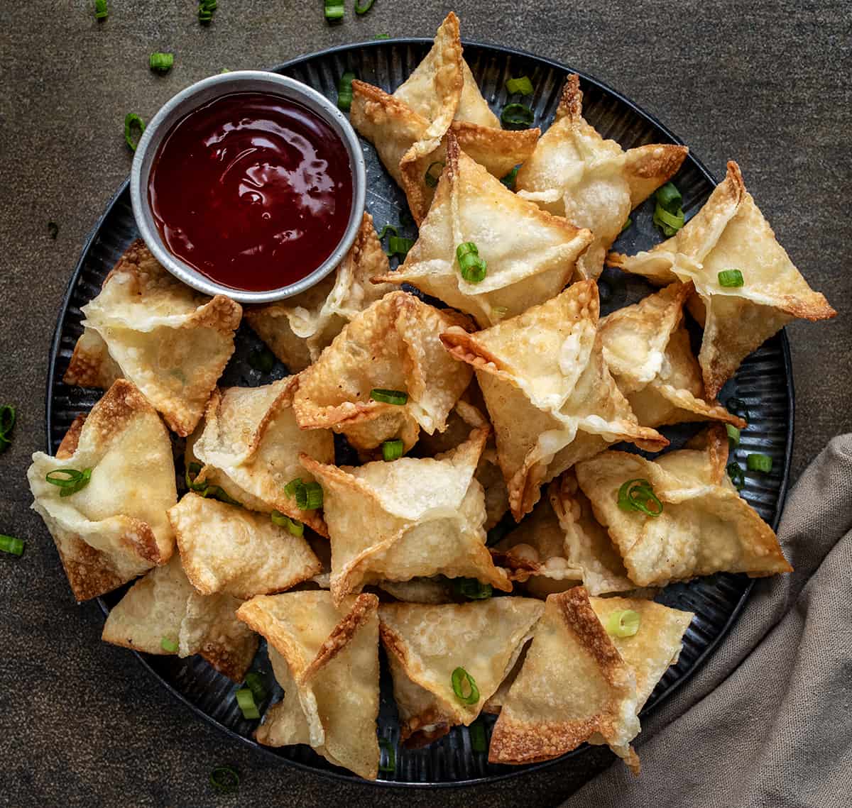 Platter of Crab Rangoon with Sauce from Overhead.