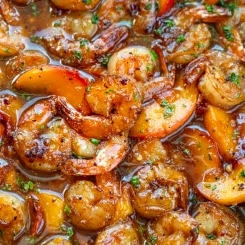 Close up of Bourbon Peach Roasted Shrimp in a Skillet.