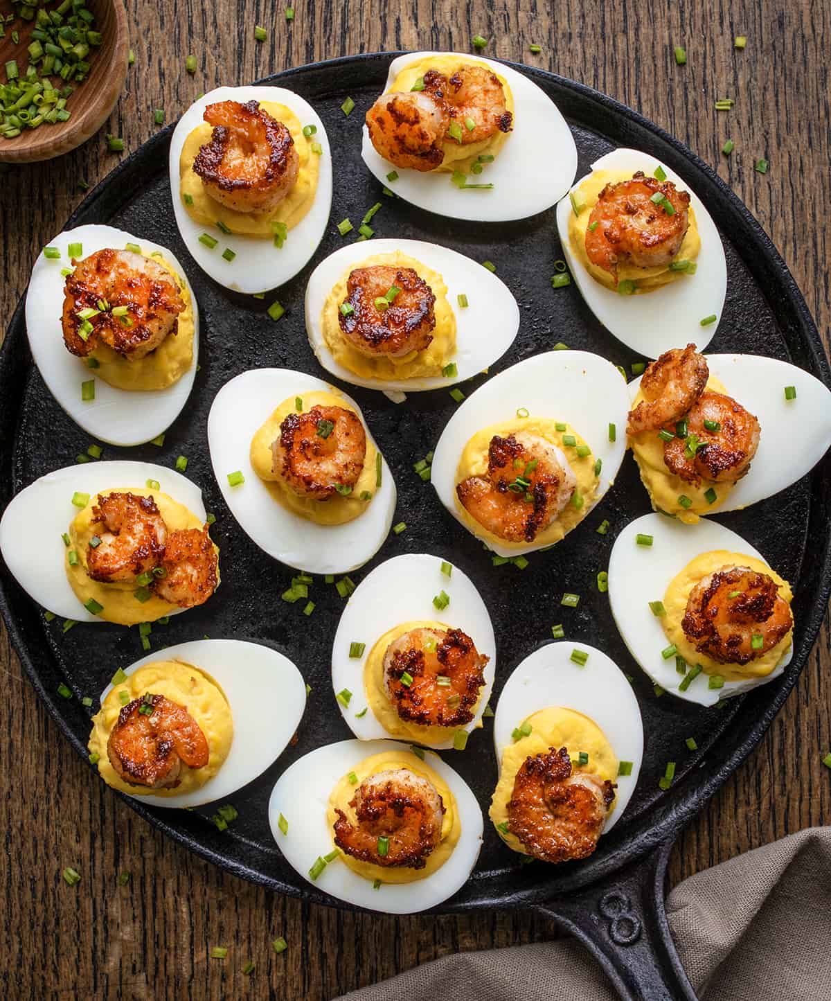 Pan of Cajun Shrimp Deviled Eggs on a Table from Overhead.