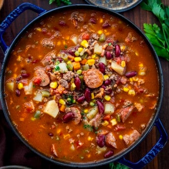 Looking Down into a Pot of Cowboy Stew on a Dark Table.