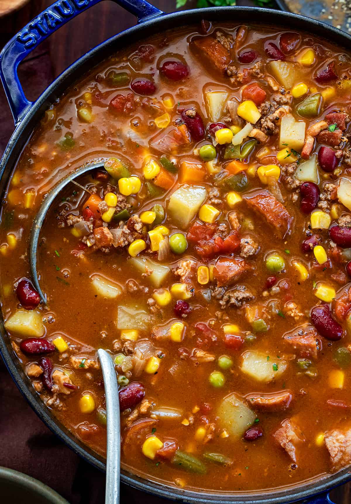 Ladle resting in Pot of Cowboy Stew.