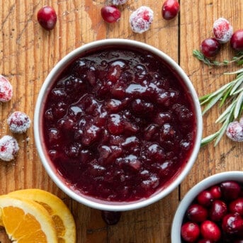 Bowl of Easy Cranberry Sauce on a wooden table.