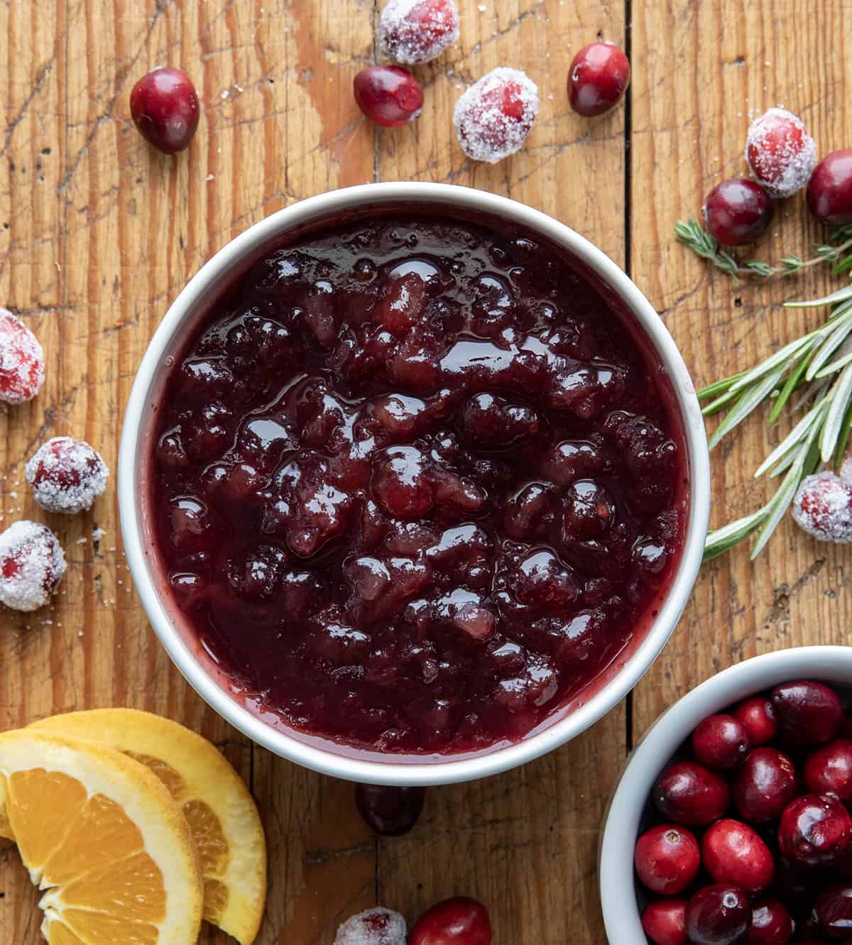 Bowl of Easy Cranberry Sauce on a wooden table.