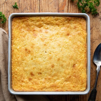 Pan of Southern Corn Pudding on a table from overhead.