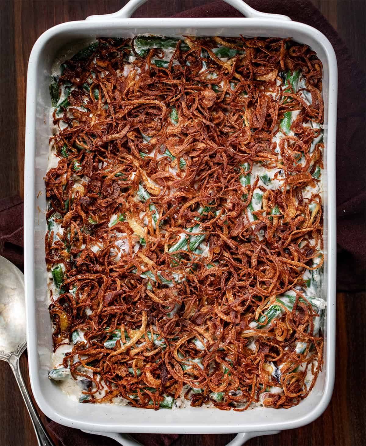 Pan of Bacon Green Bean Casserole on a table from overhead.