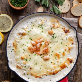 Pan of Baked Shrimp Dip on a table.