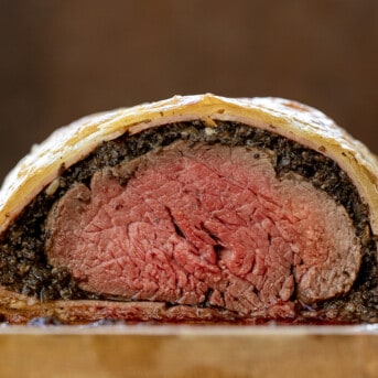 Inside of Beef Wellington showing medium rare beef.