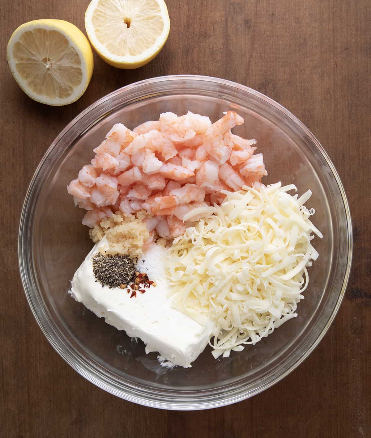Raw ingredients in a bowl for Baked Shrimp Dip.