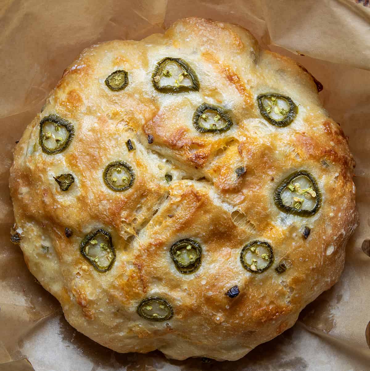 Loaf of Jalapeno Cheddar Bread on a wooden cutting board