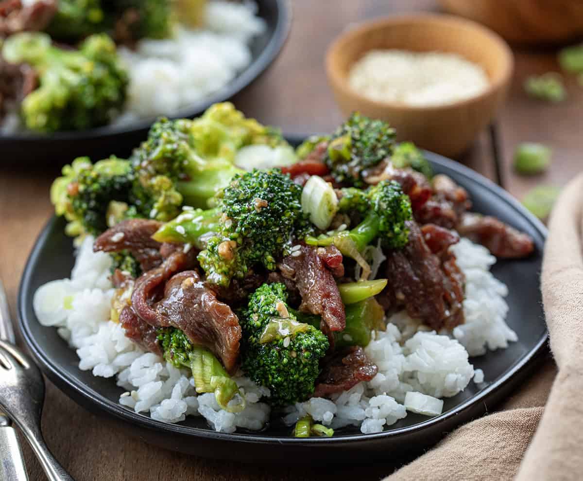 Plate of Beef and Broccoli on a wooden table.