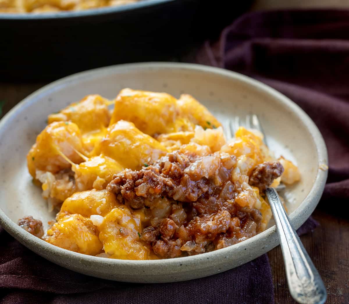 PLate of Sloppy Joe Tater Tot Casserole with a fork.