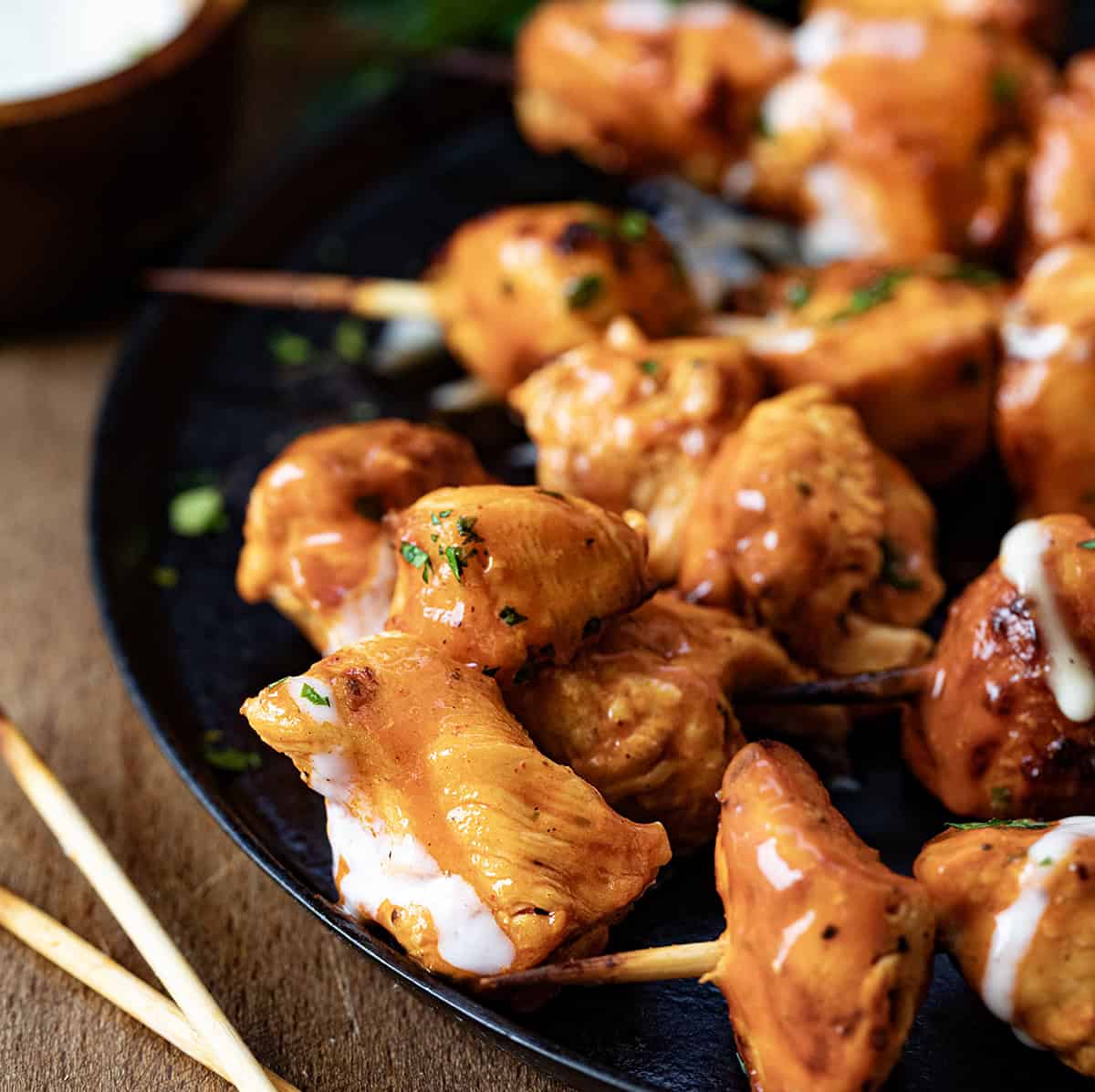Close up of pieces of Buffalo Ranch Chicken Skewers off the skewer.