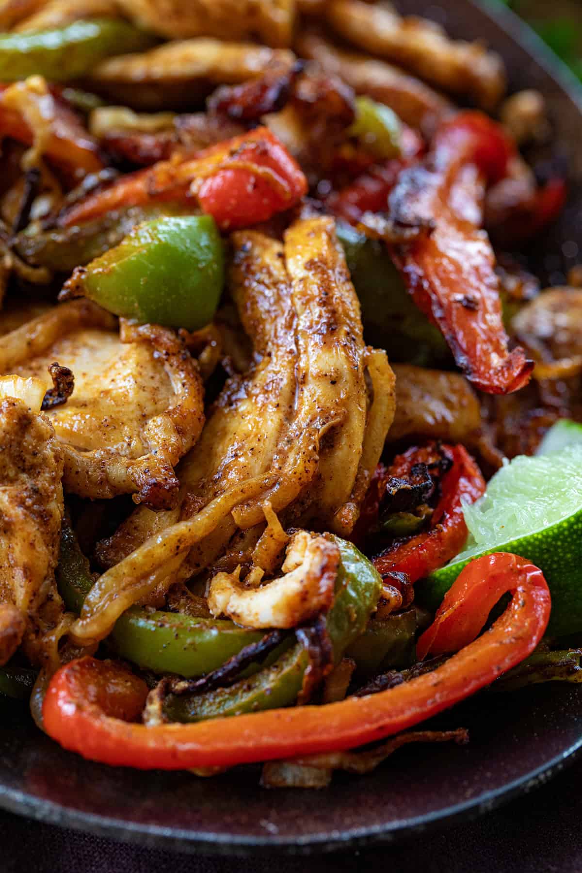 Very close up of Air Fryer Chicken Fajita meat and vegetables.