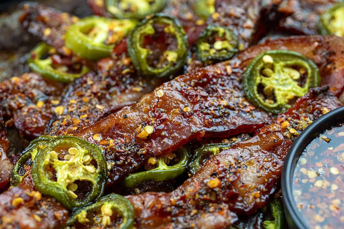 Close up of spicy candied bacon with jalapeno.