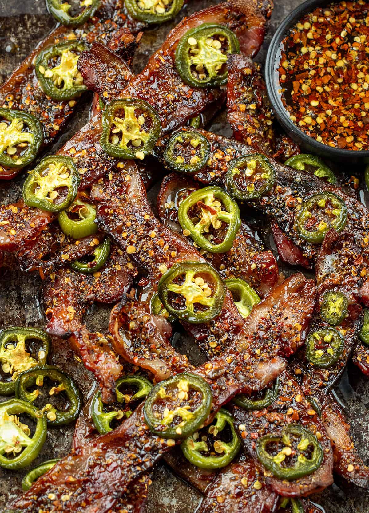 Close up of spicy candied bacon with jalapeno.