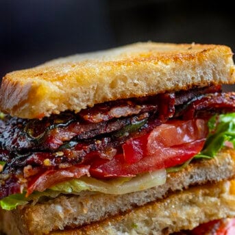 Close up of half of a Spicy Candied Bacon BLT.