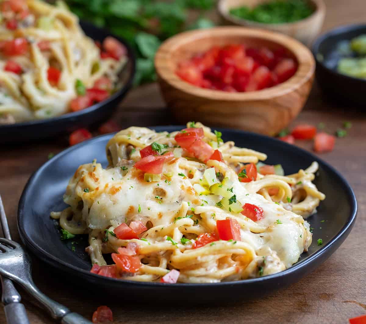 Plate of Cheeseburger Tetrazzini on a wooden table.