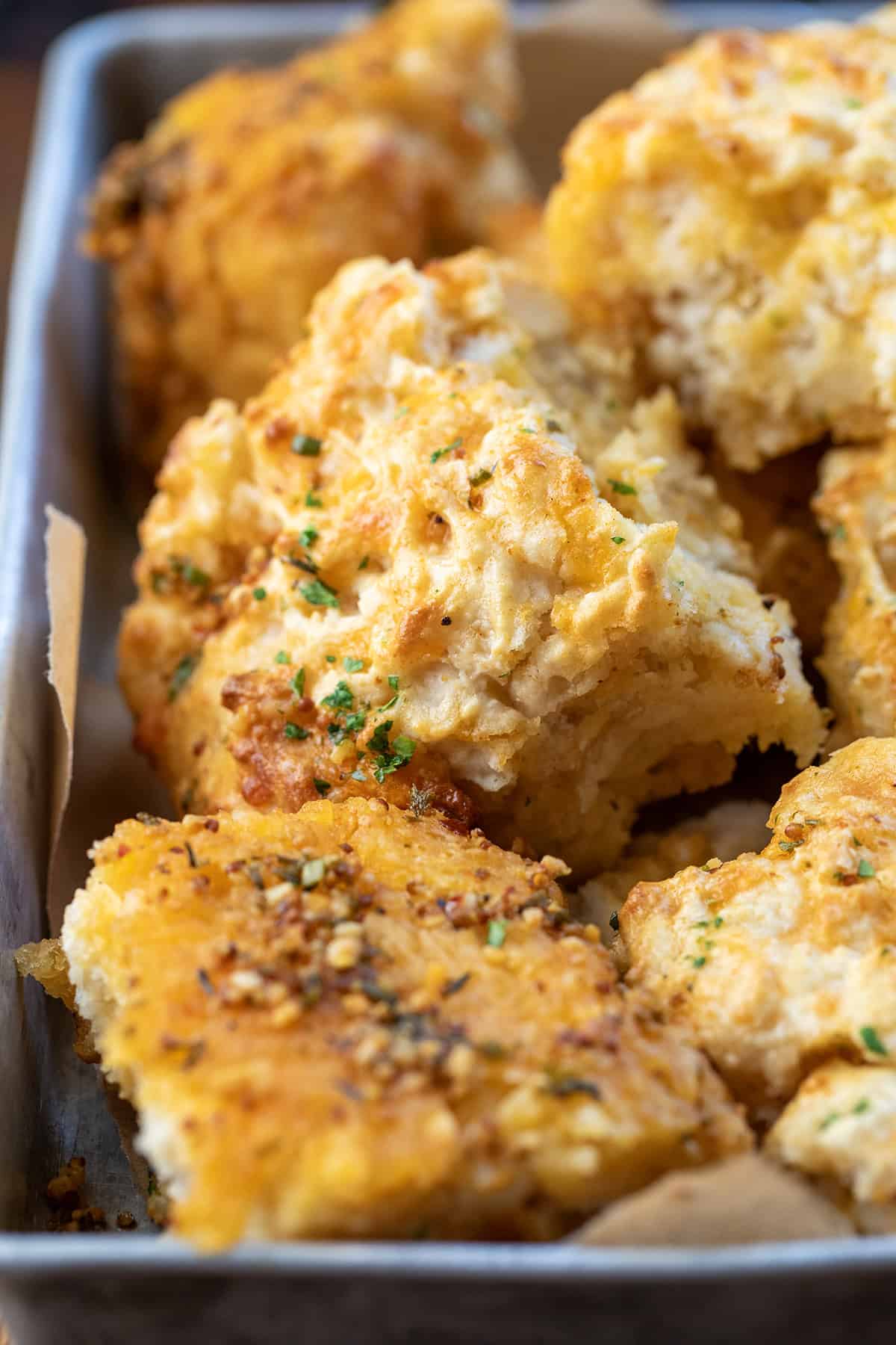 Close up of Cowboy Butter Swim Biscuits in a pan.