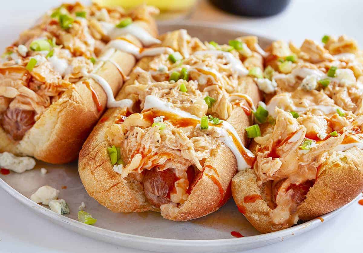 plate of 3 buffalo chicken hot dogs