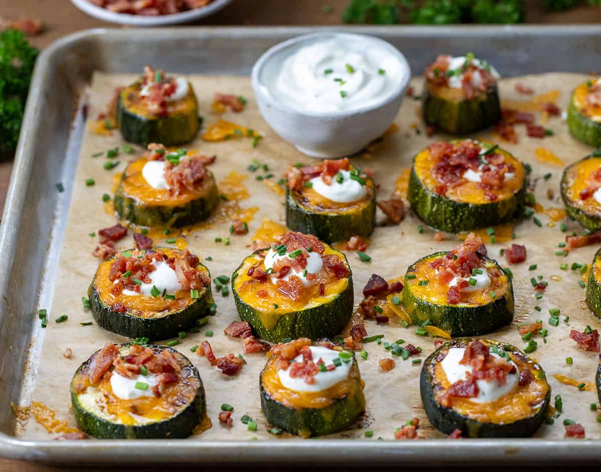 Sheet pan full of Loaded Zucchini Bites.