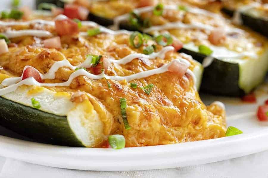 plate with buffalo chicken zucchini boat