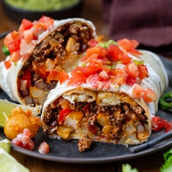 Cut into Cowboy Burrito showing inside ingredients.