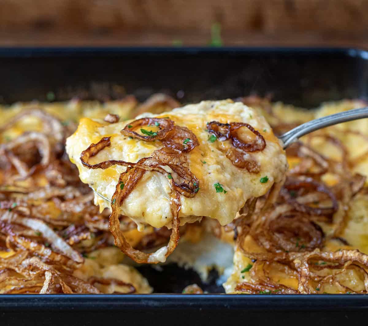 Scooping up a bite of Fried Onion Scalloped Potatoes.