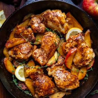 Skillet of Apple Chicken with apples, thyme, and lemon.