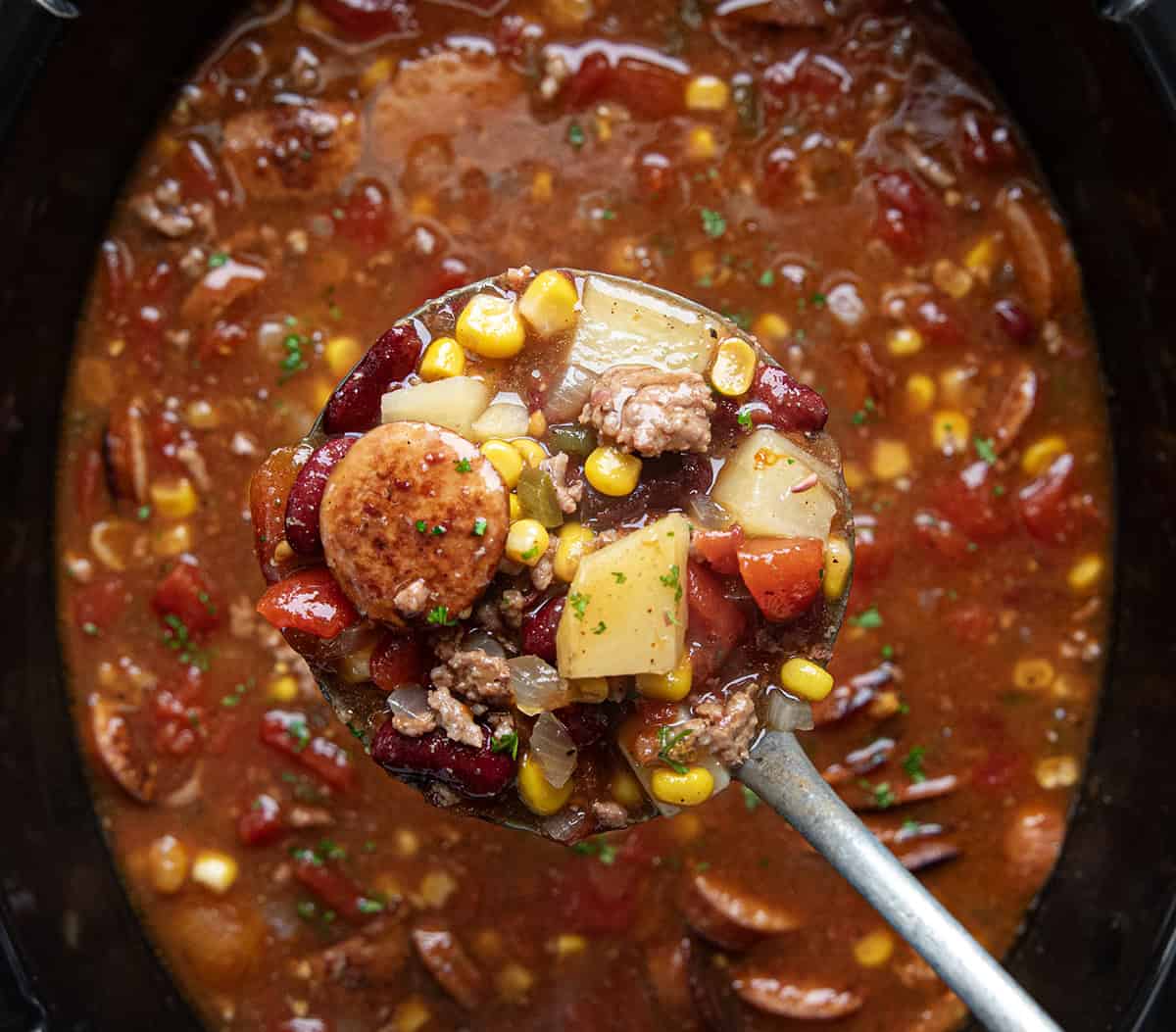 Ladle full of Slow Cooker Cowboy Soup.