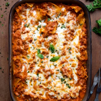 Pan of Easy Lasagna Casserole on a wooden table from overhead.