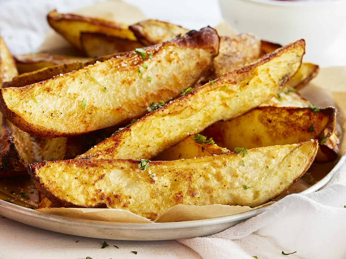 Plate with roasted potato wedges