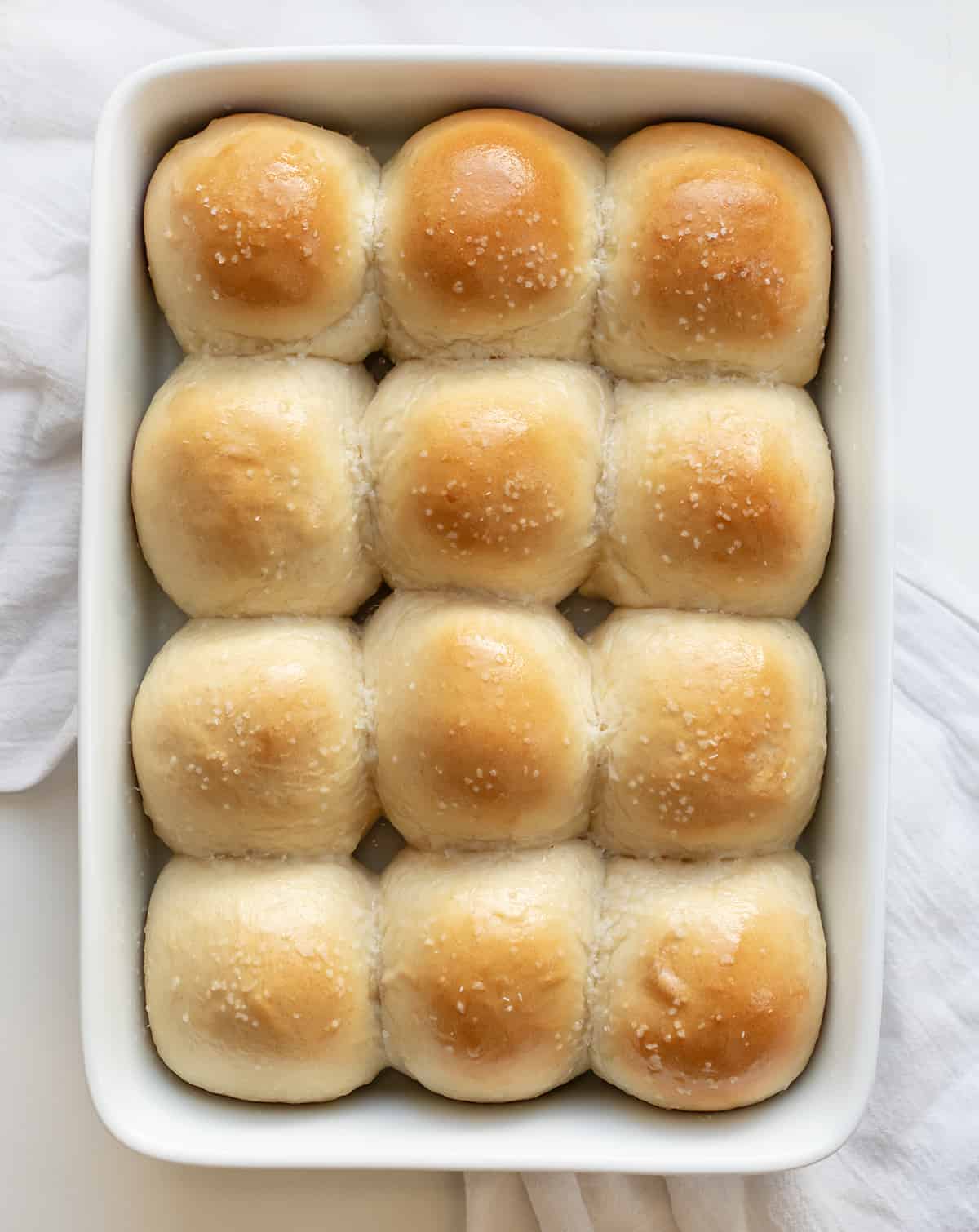 overhead of baking dish of dinner rolls