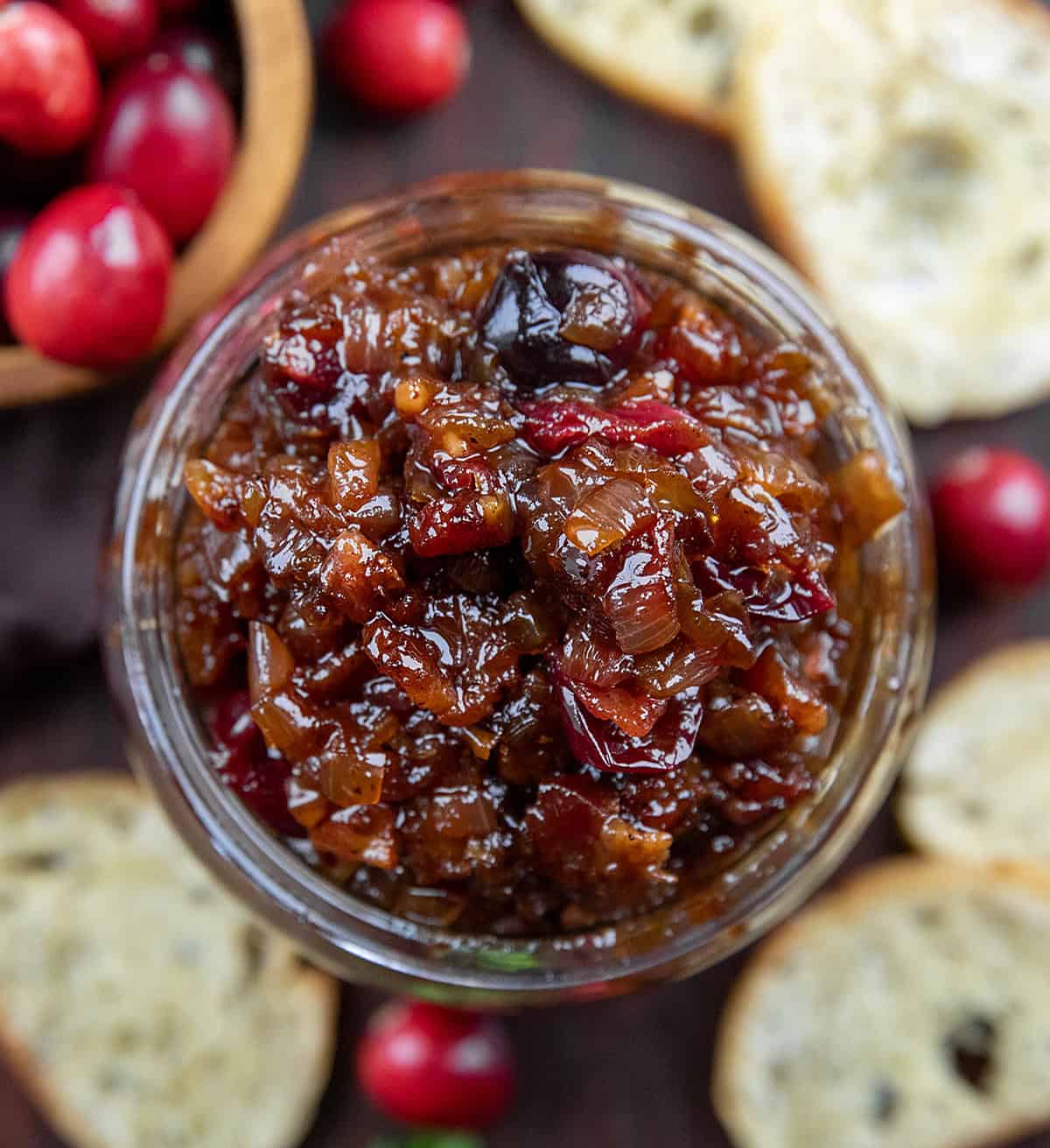 Looking down on a jar of Cranberry Bacon Jam very close up.