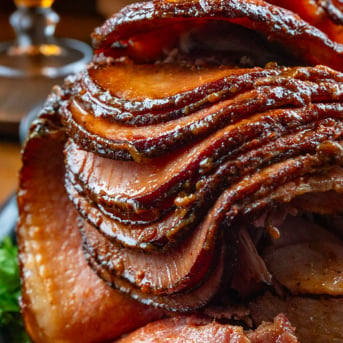 Spiral Maple Bourbon Glazed Ham on a wooden table.