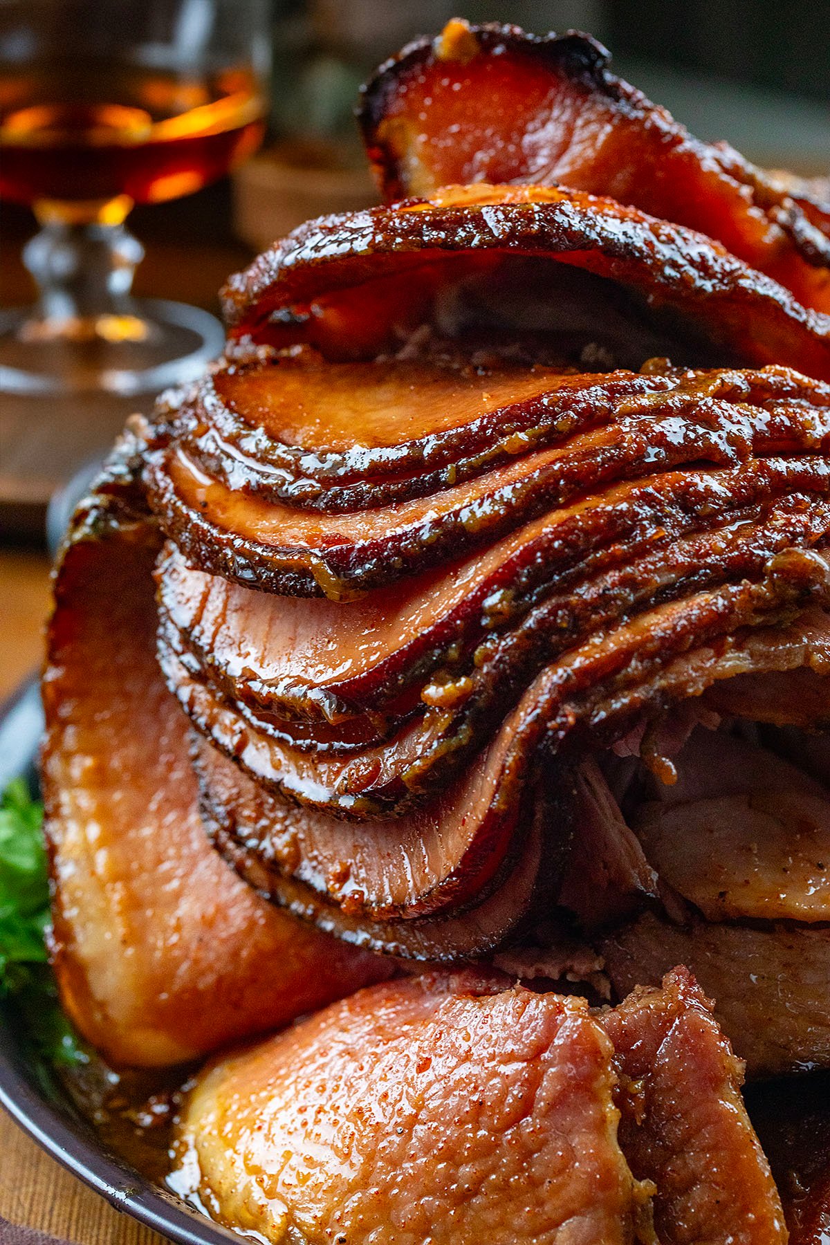 Spiral Maple Bourbon Glazed Ham on a wooden table.