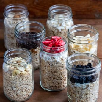 Jars of Homemade Instant Oatmeal on a wooden table.