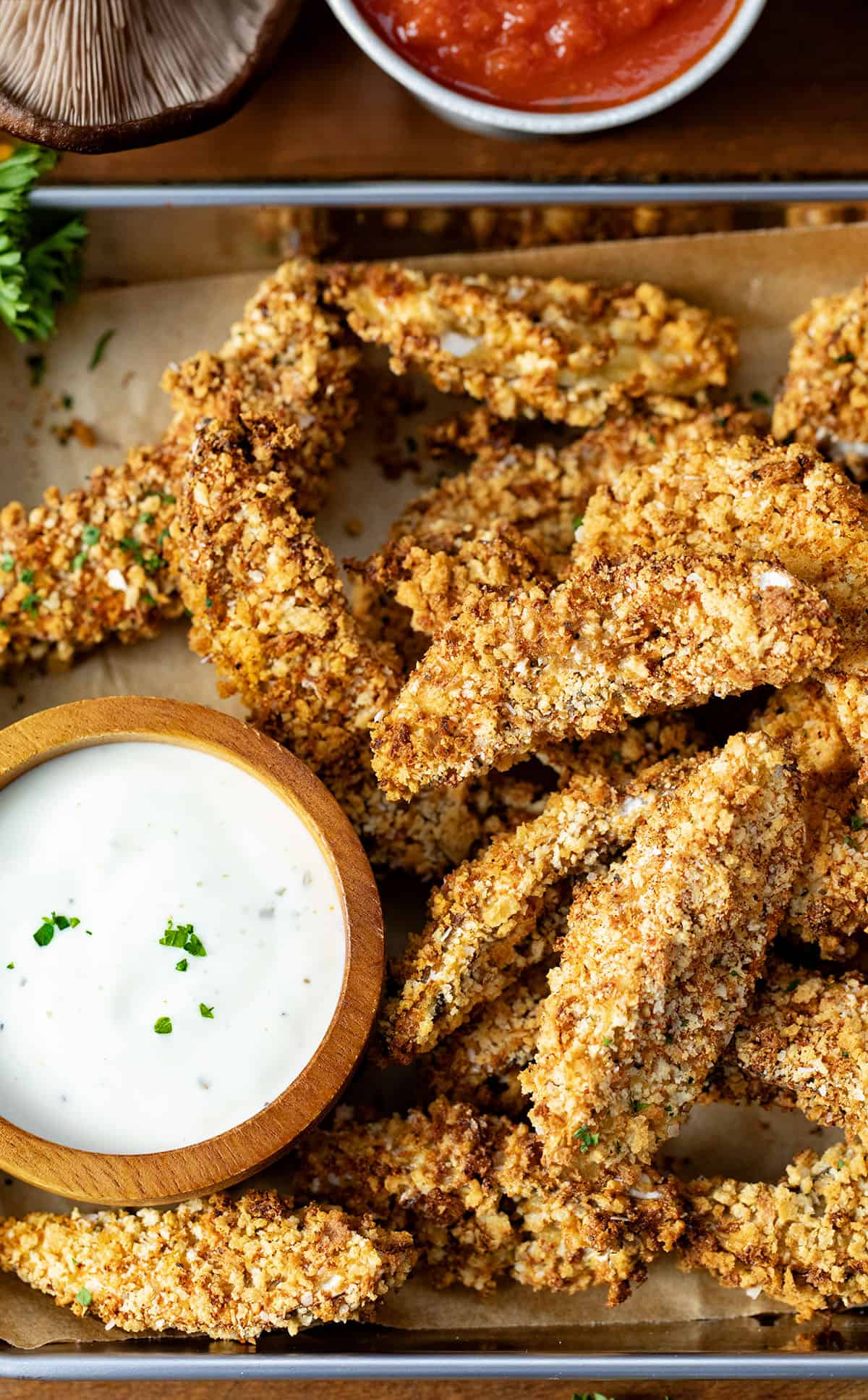 Tray of Portobello Mushroom Fries with ranch and marinara sauce.