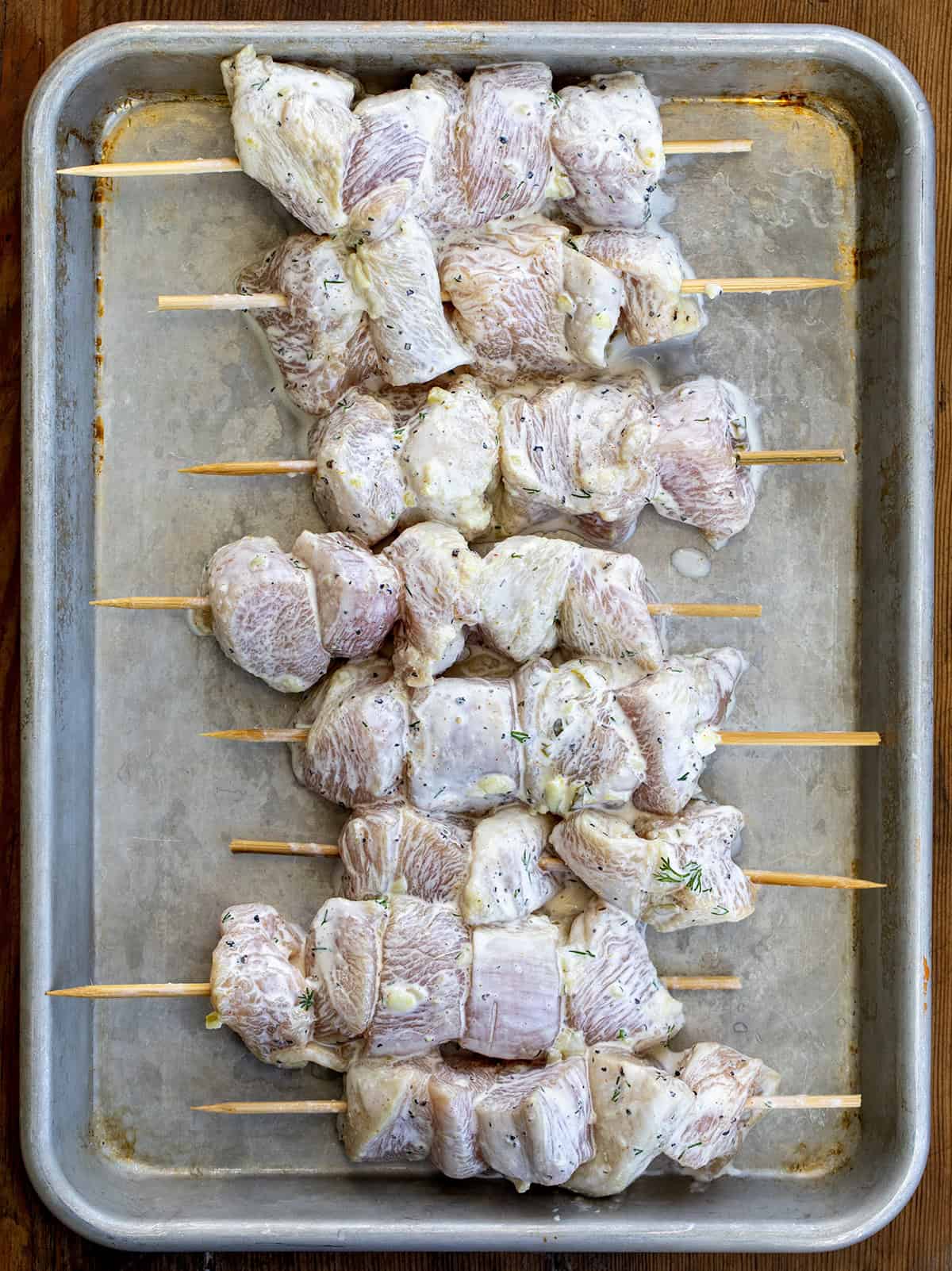 Raw Dill Pickle Ranch Chicken on Skewers before cooking.