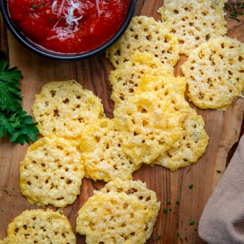 Parmesan Crisps's on a cutting board from overhead.