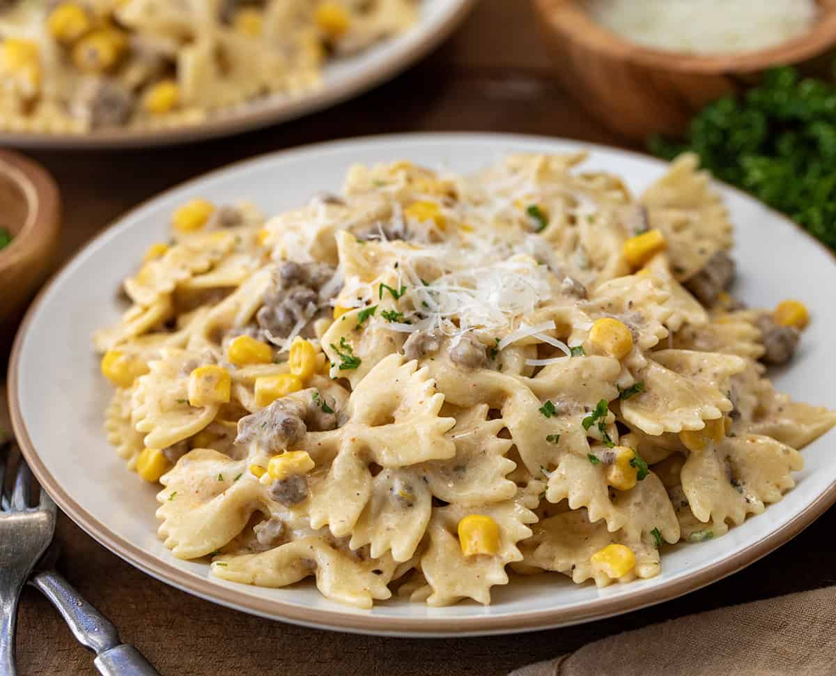 Plate of Creamy Ranch Beef Pasta on a wooden table.