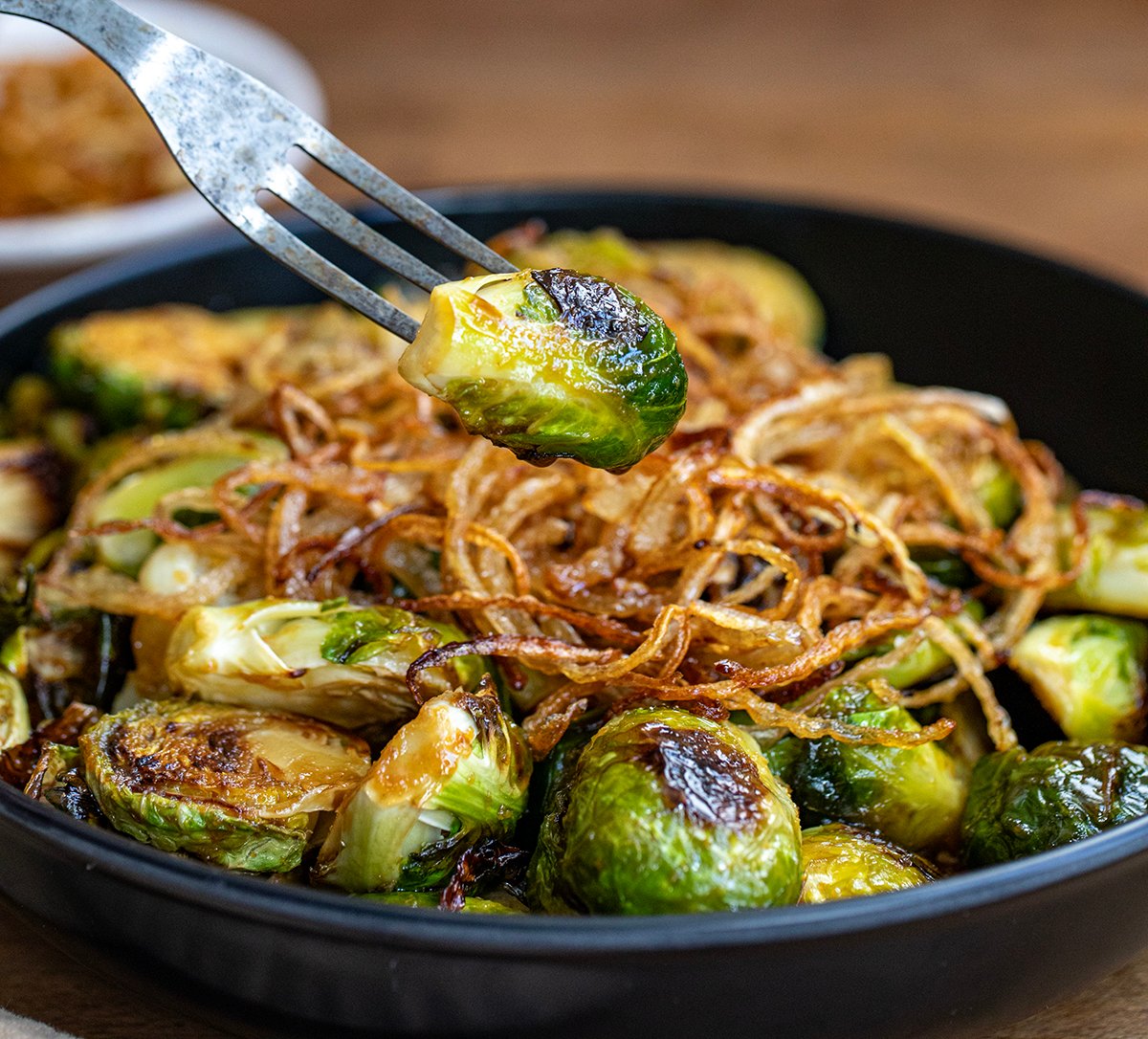 Fork holding a Red Lobster Crispy Brussels Sprout.